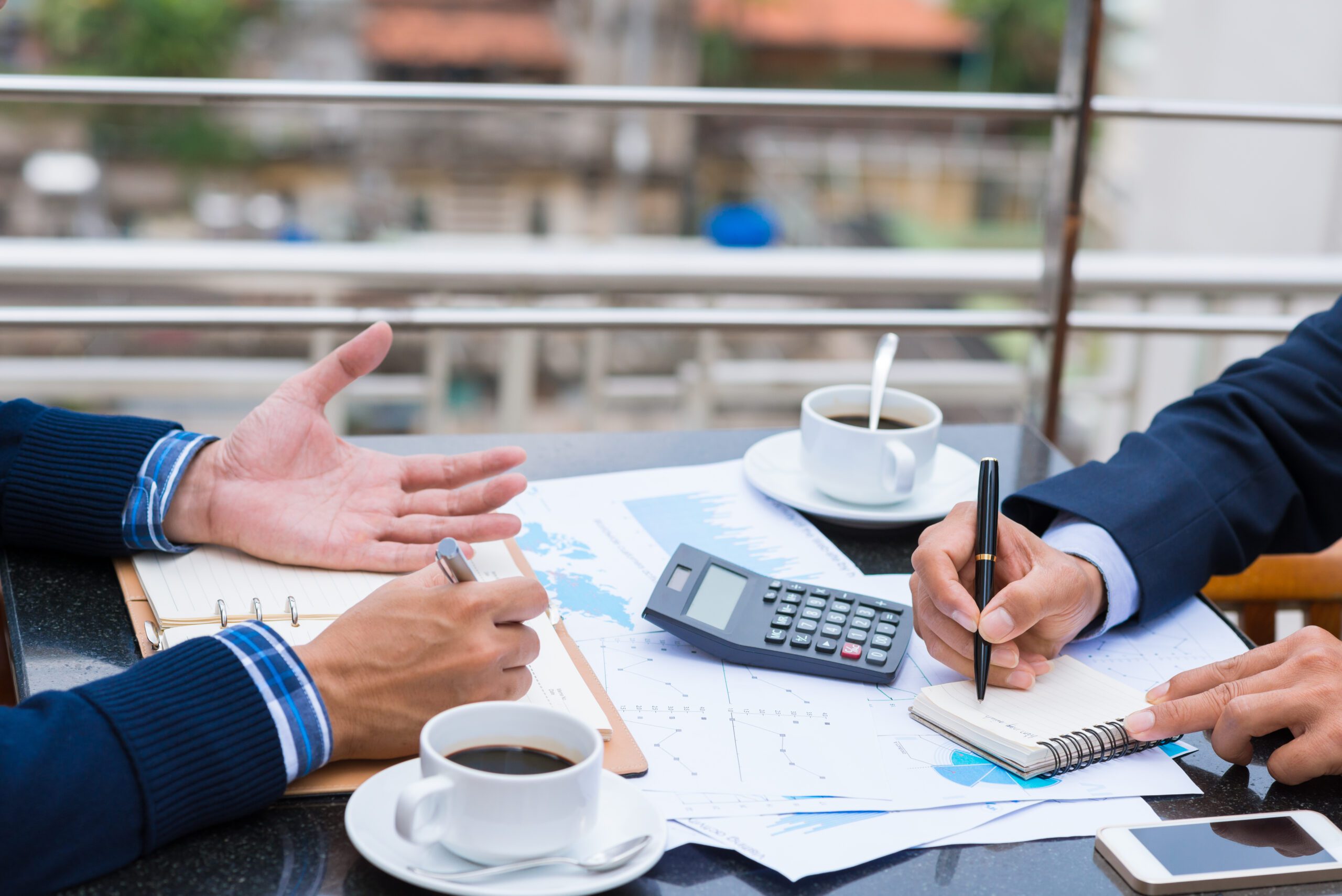 Cropped,Image,Of,Business,People,Analyzing,Financial,Documents