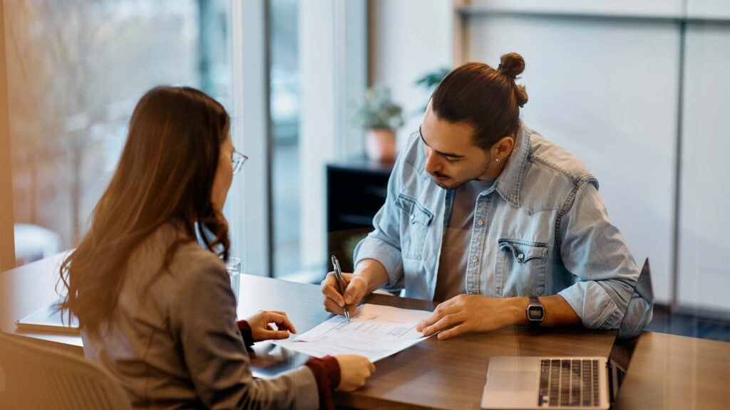 customer meets with a National Business Capital expert to refinance their business loan.